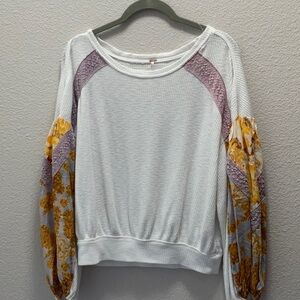 This Free People top is ideal for weekends.  No size found, but looks to fit M/L